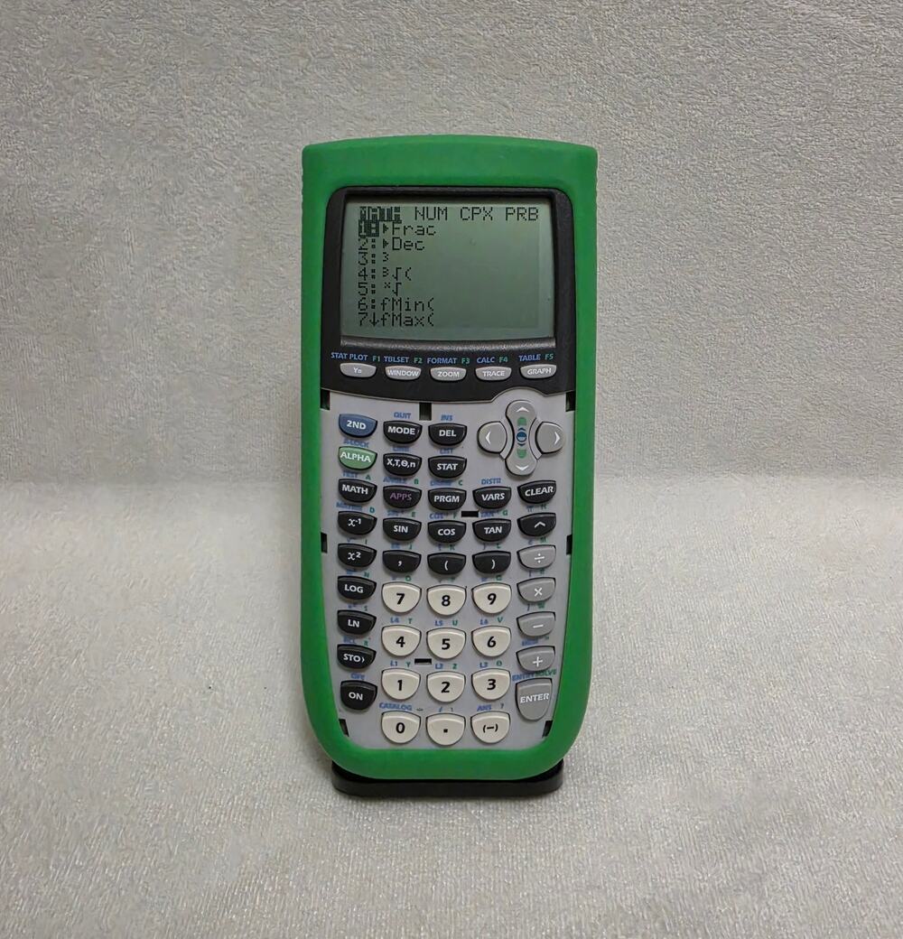 TI-83: Texas Instruments TI-83 Plus Graphing Calculator w/ Green Cover - Tested